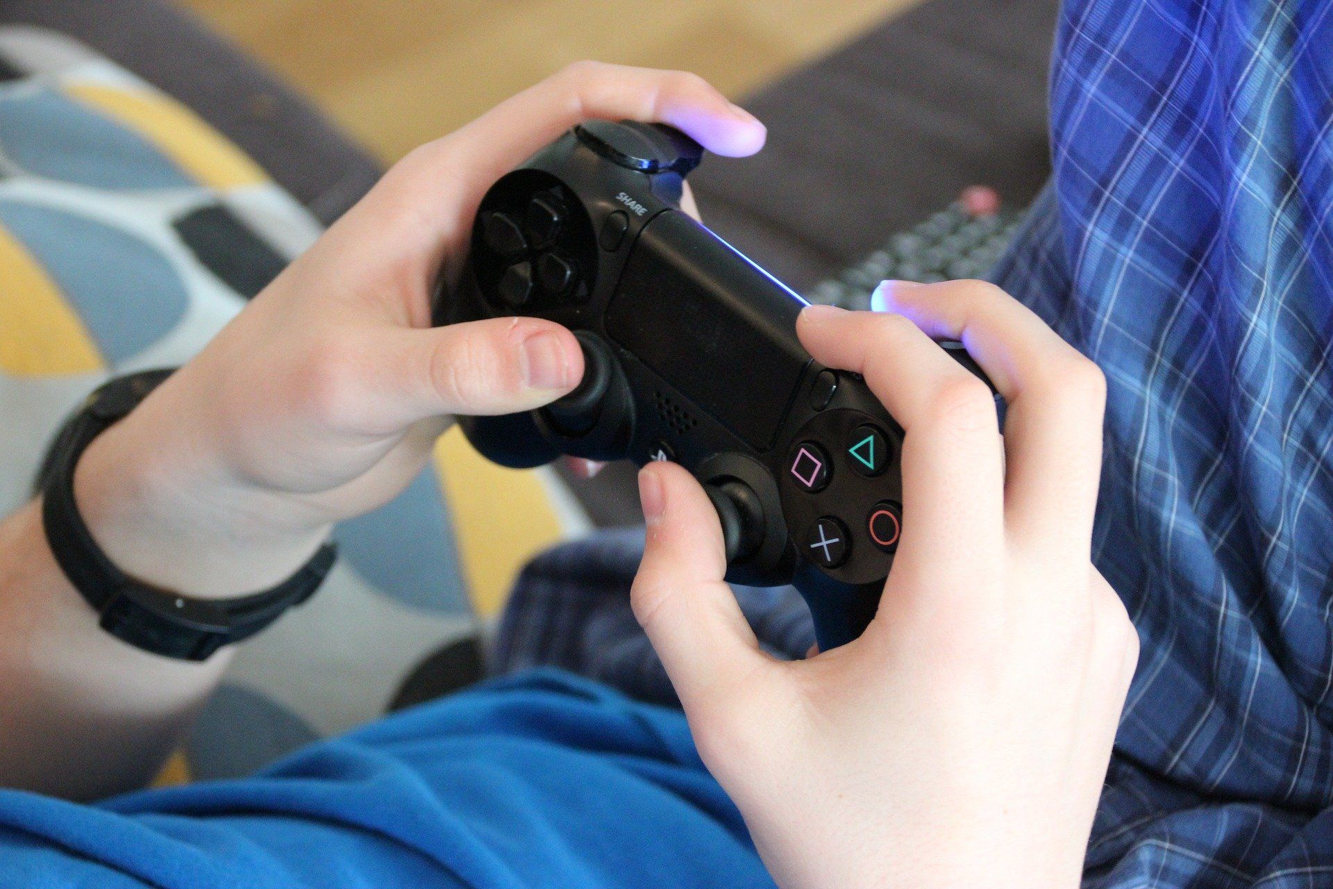 A boy with a game controller