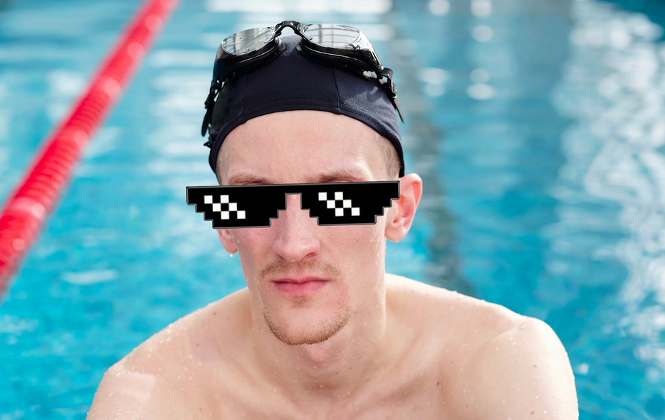 A diver in a pool looking calm and ready for the next test