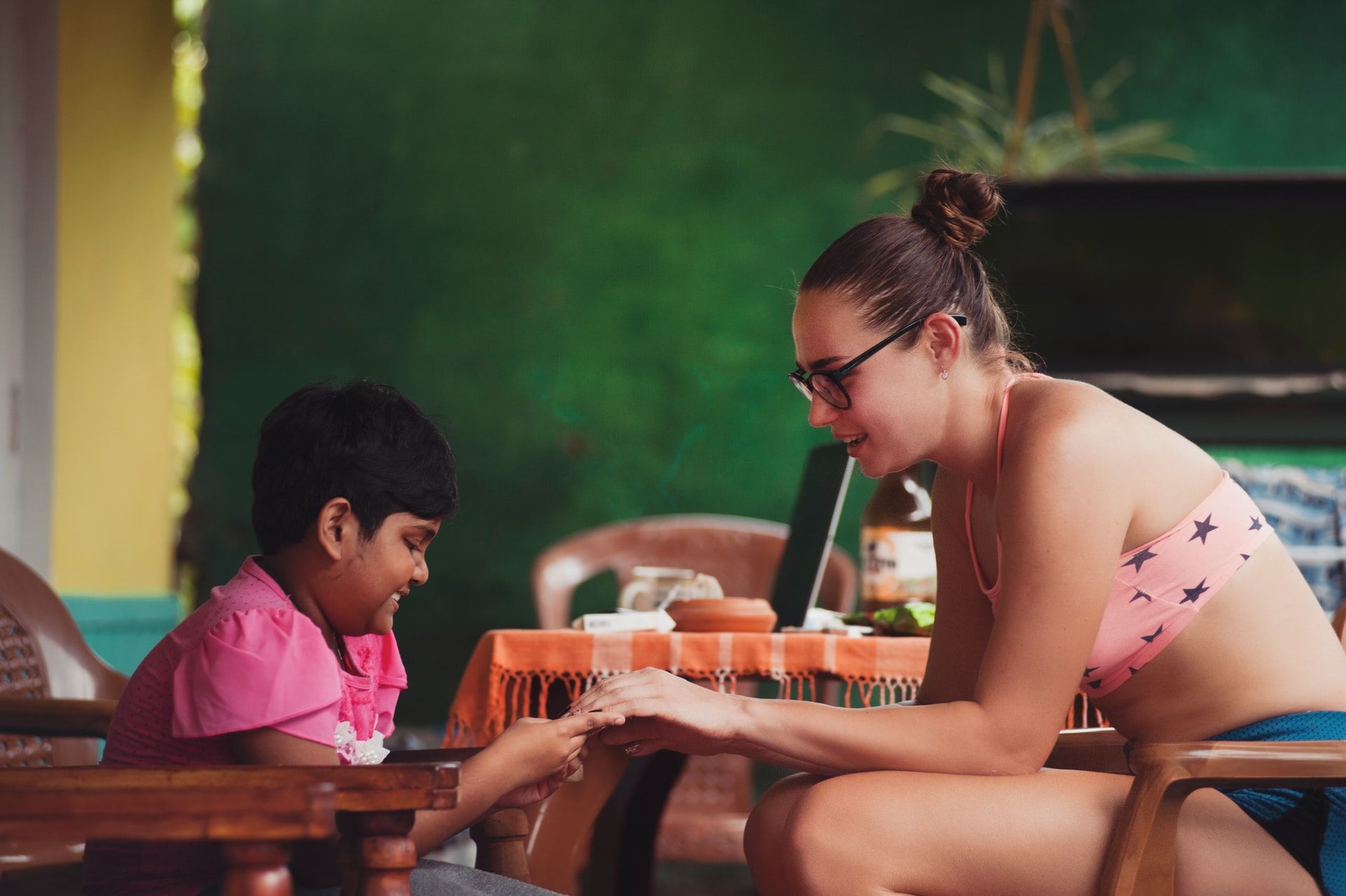 Woman teaching boy using Feynman Technique