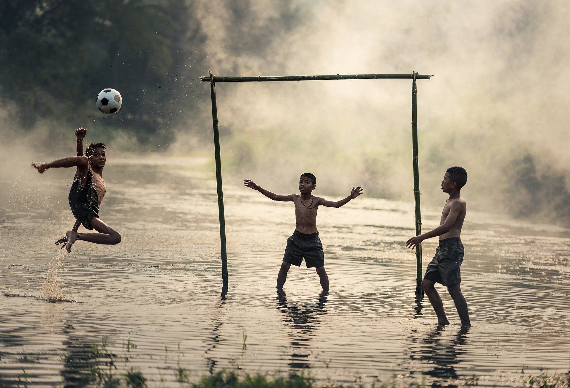 Kids playing football