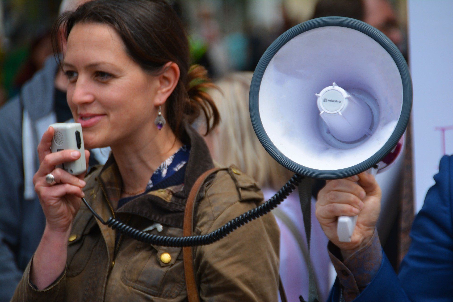 Lady with megaphone speaking