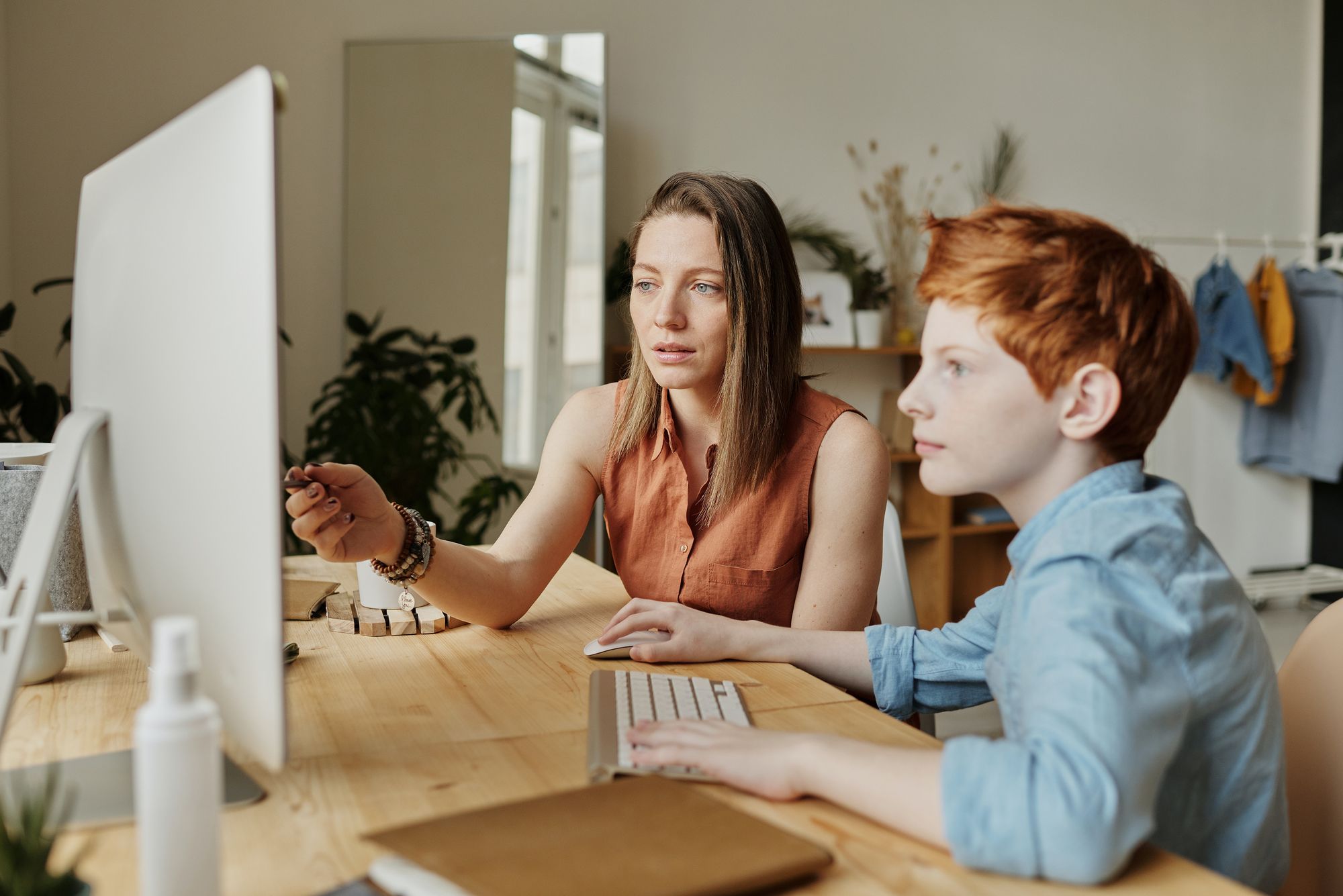 Student teaching a kid