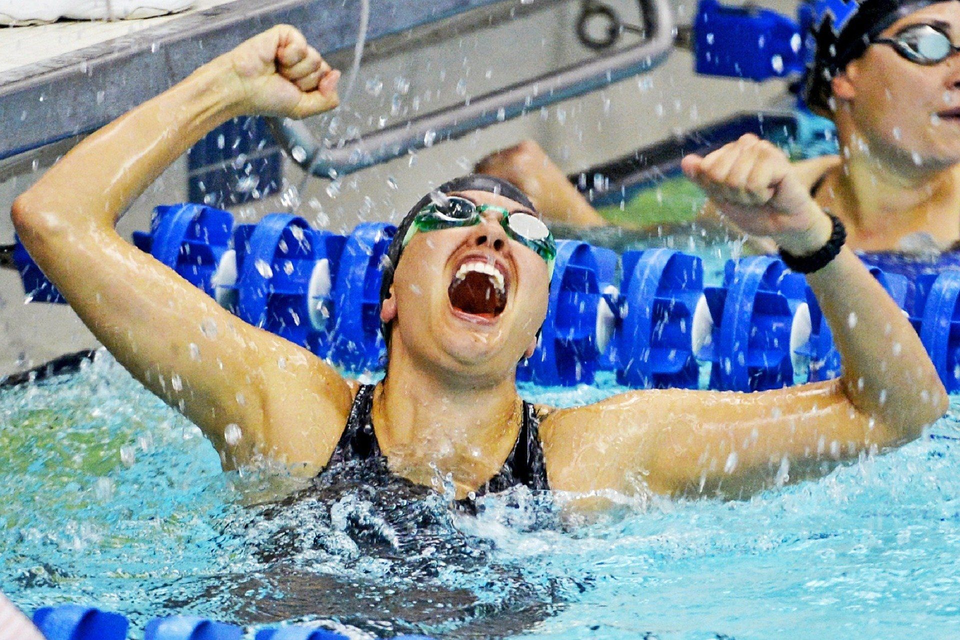 Swimmer celebrating a win