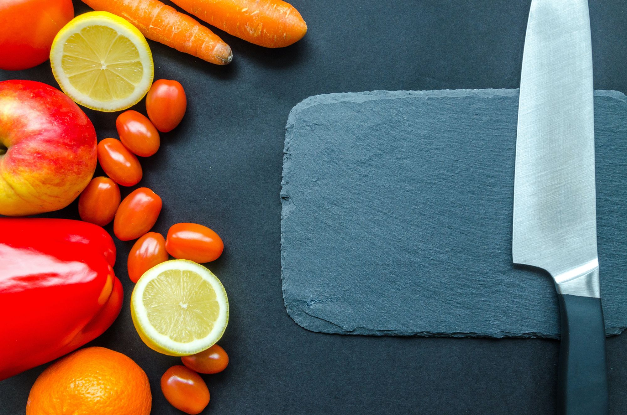 Vegetables and a chopping board