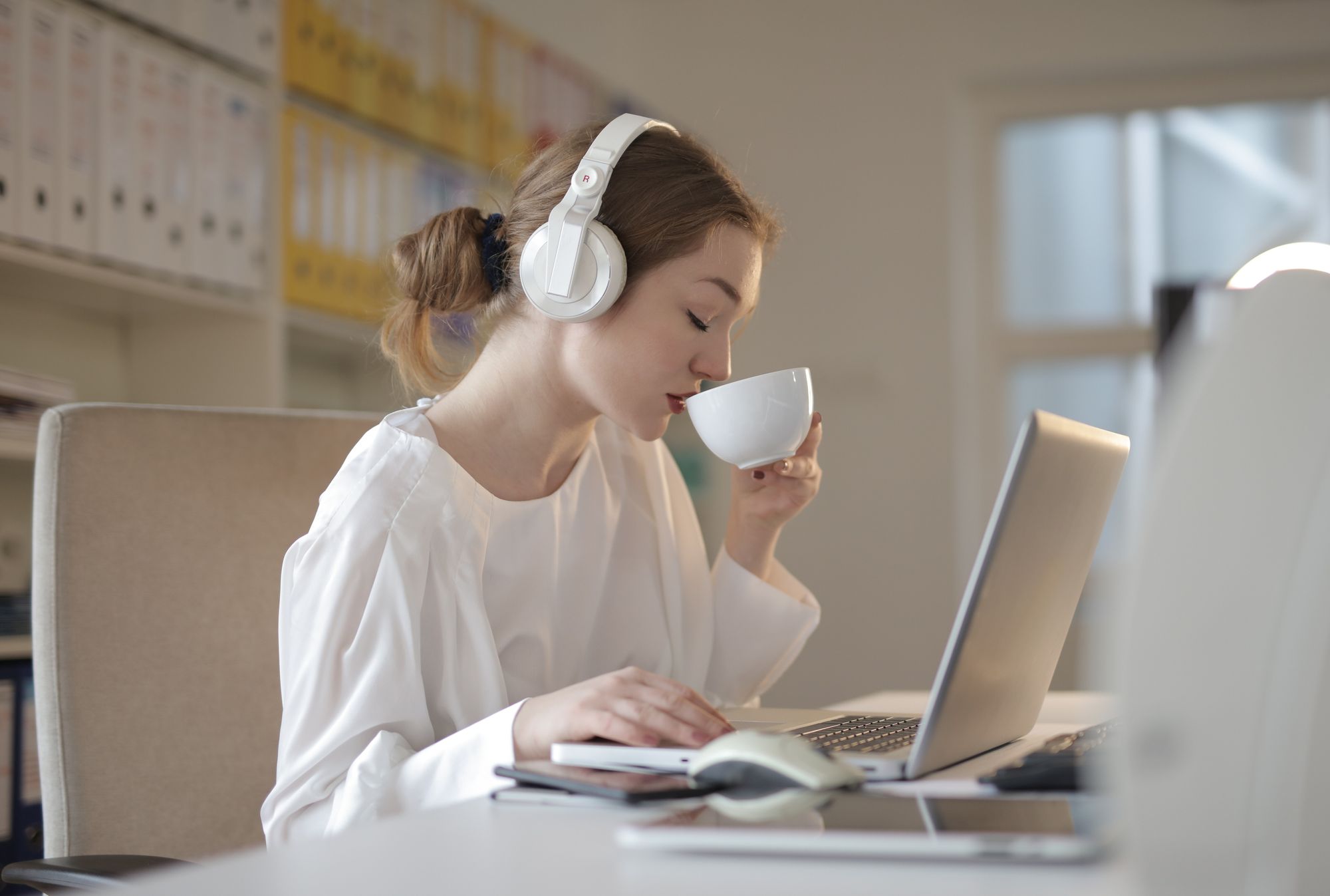 Woman on laptop learning how to focus
