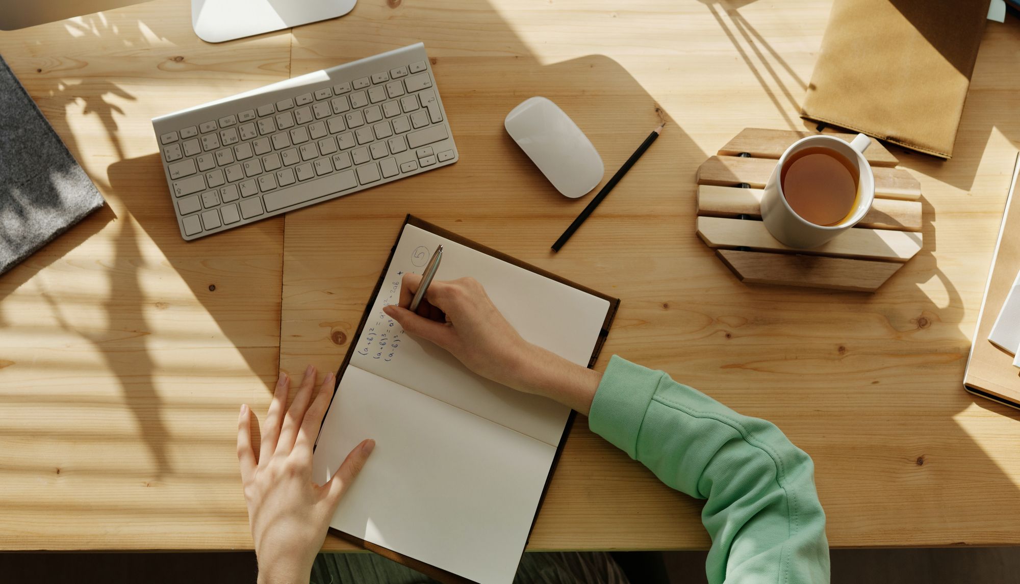 Workspace with notebooks and pens