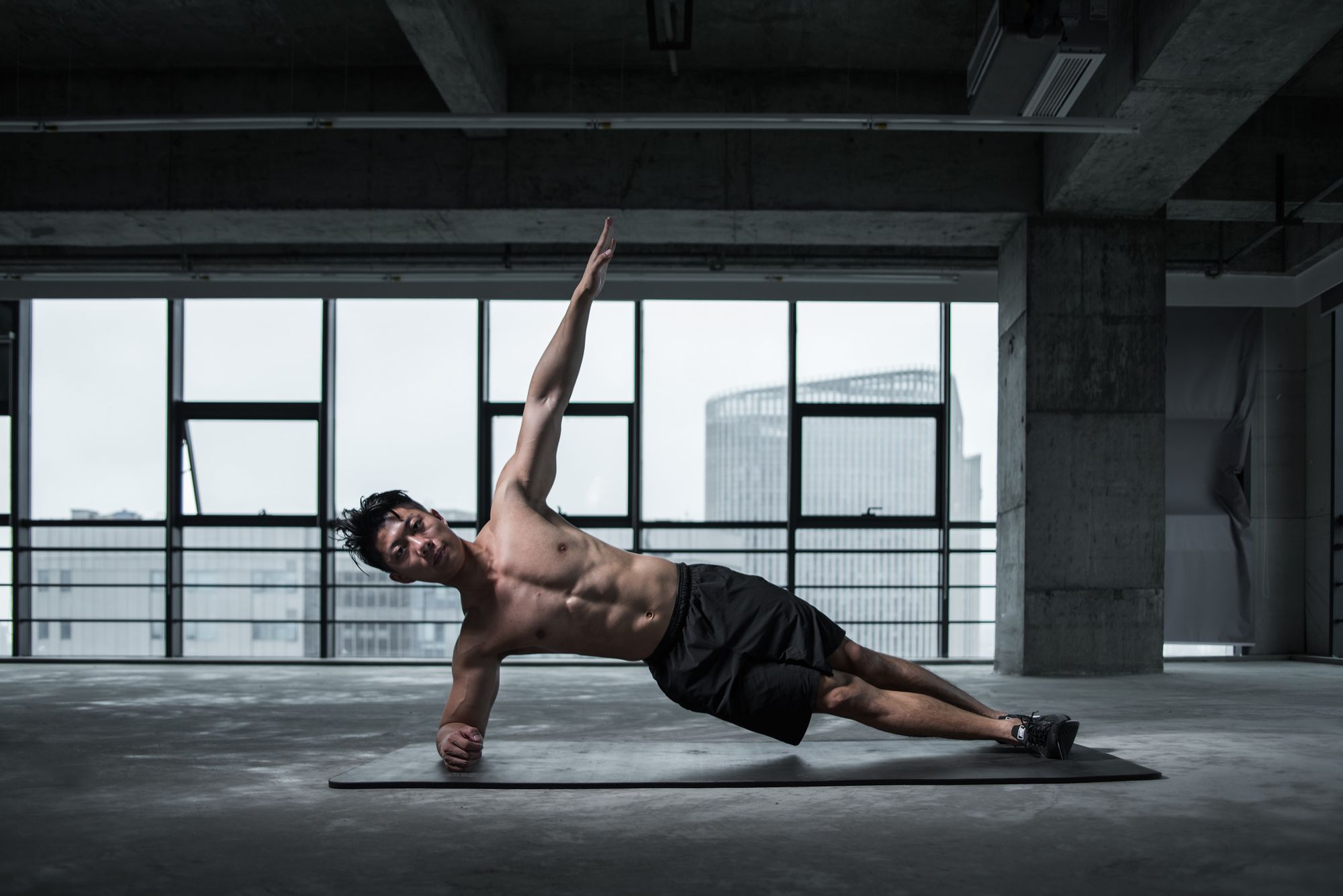 Man striking a yoga pose