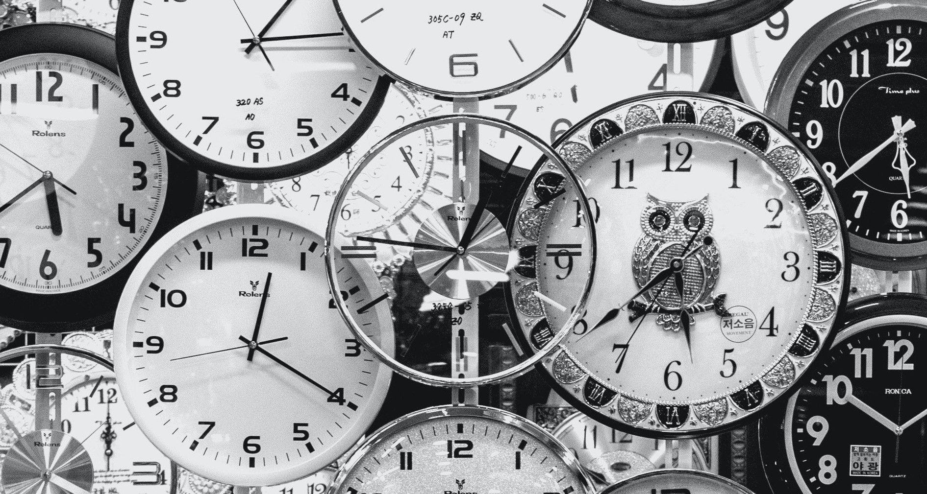 Many black and white clocks