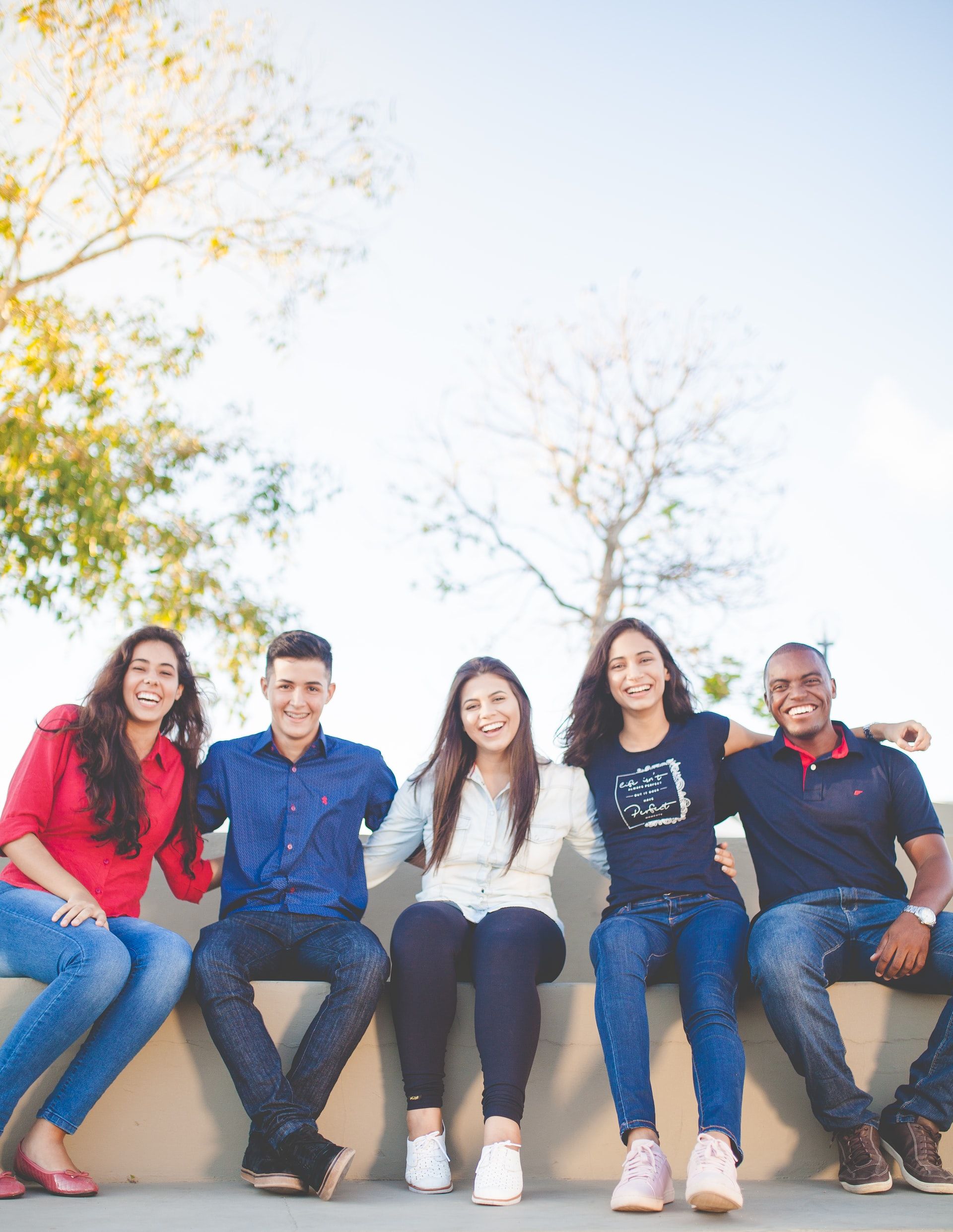 College students sitting on bench