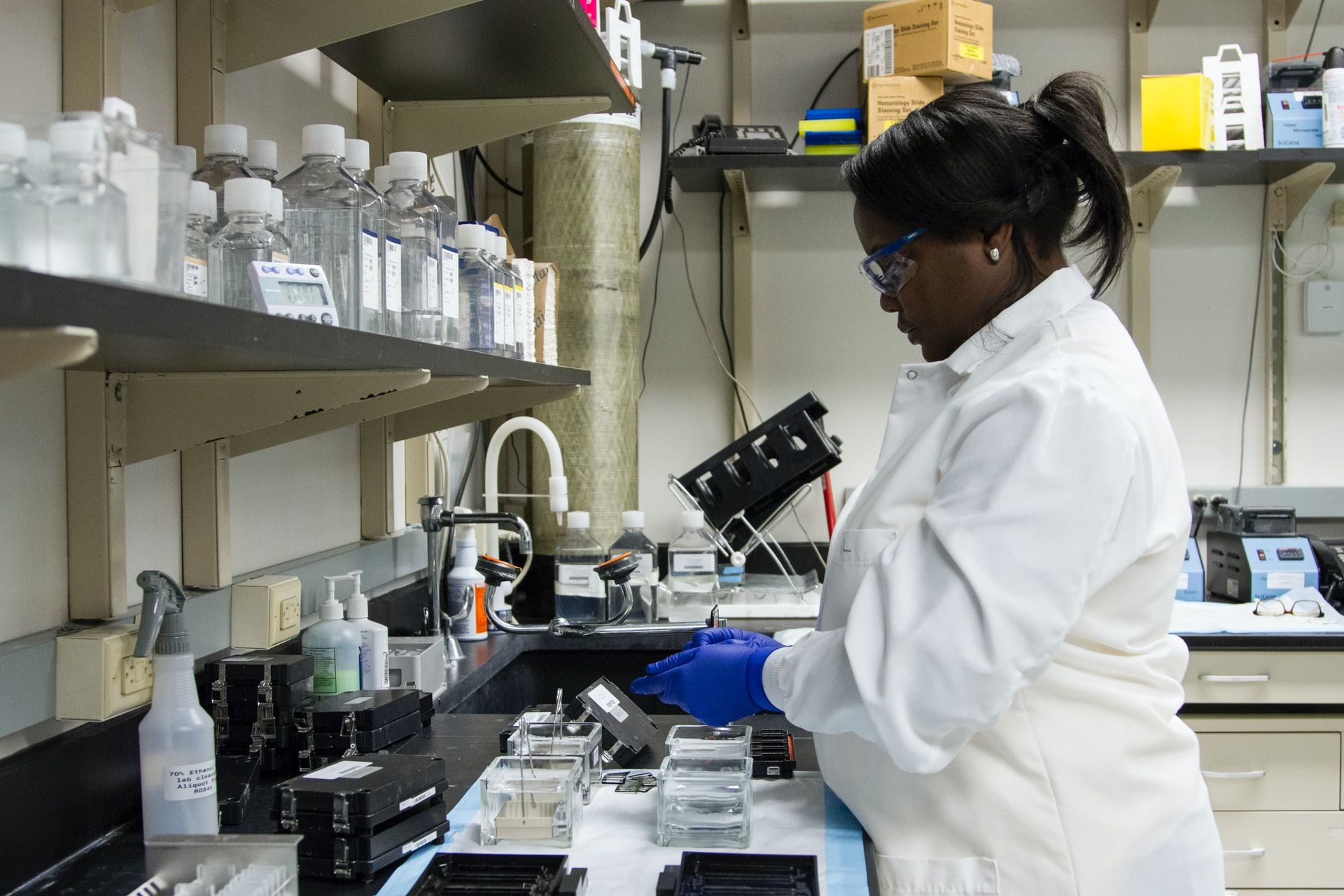 Biology discoveries lab tech in white coat