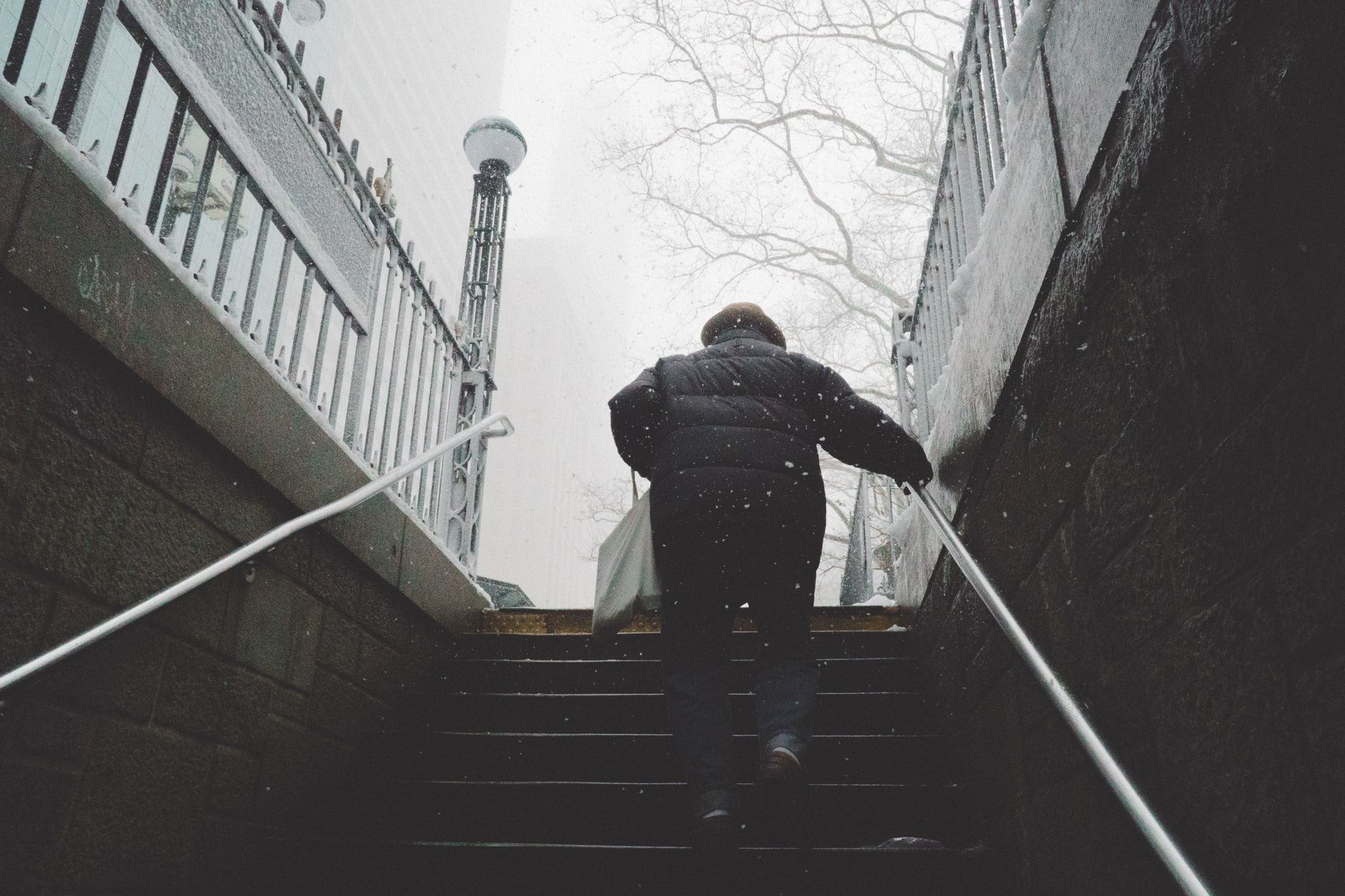 Man walking up stairs exercise without gym