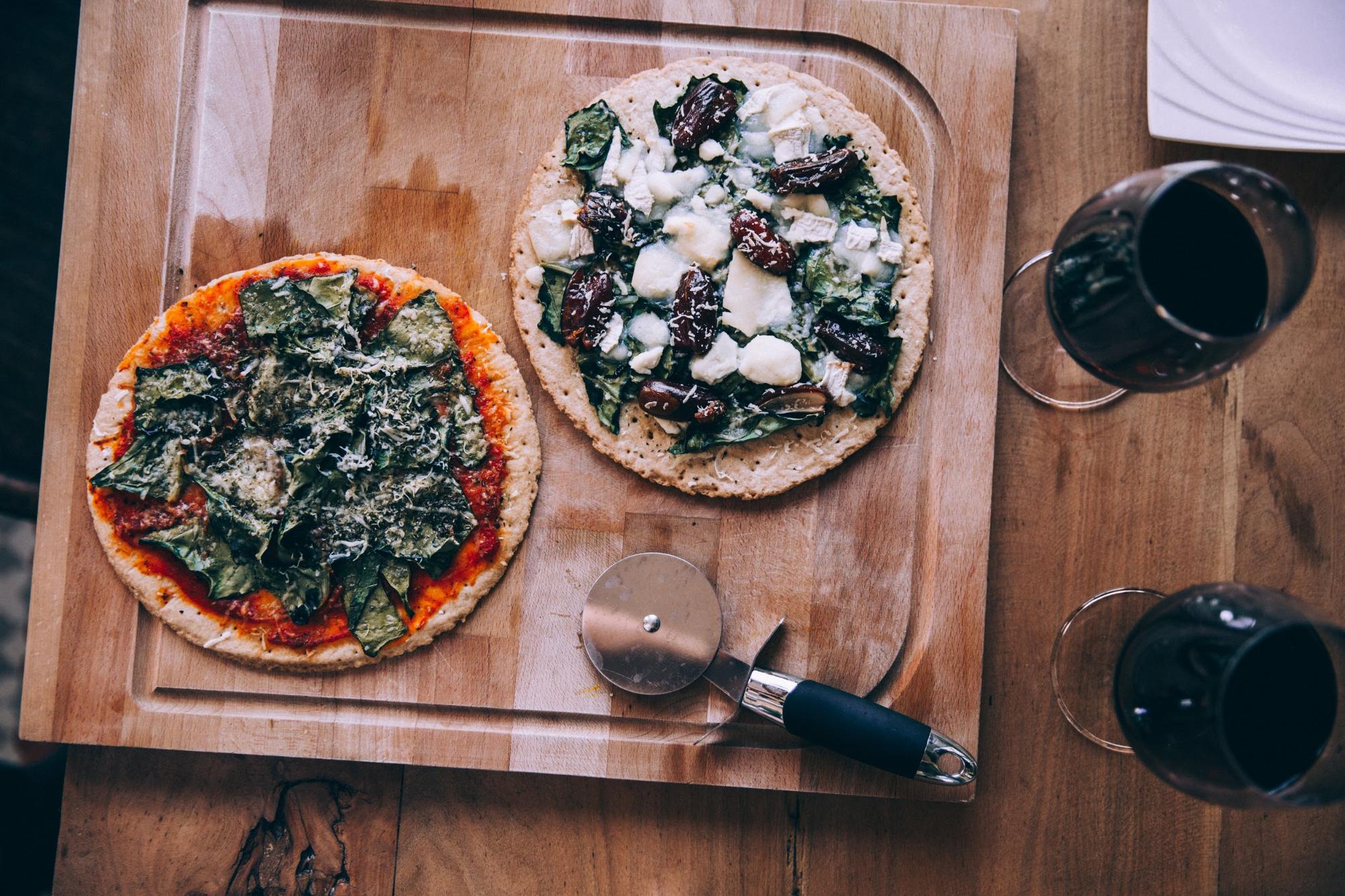 Pizza on a table; wine sommelier