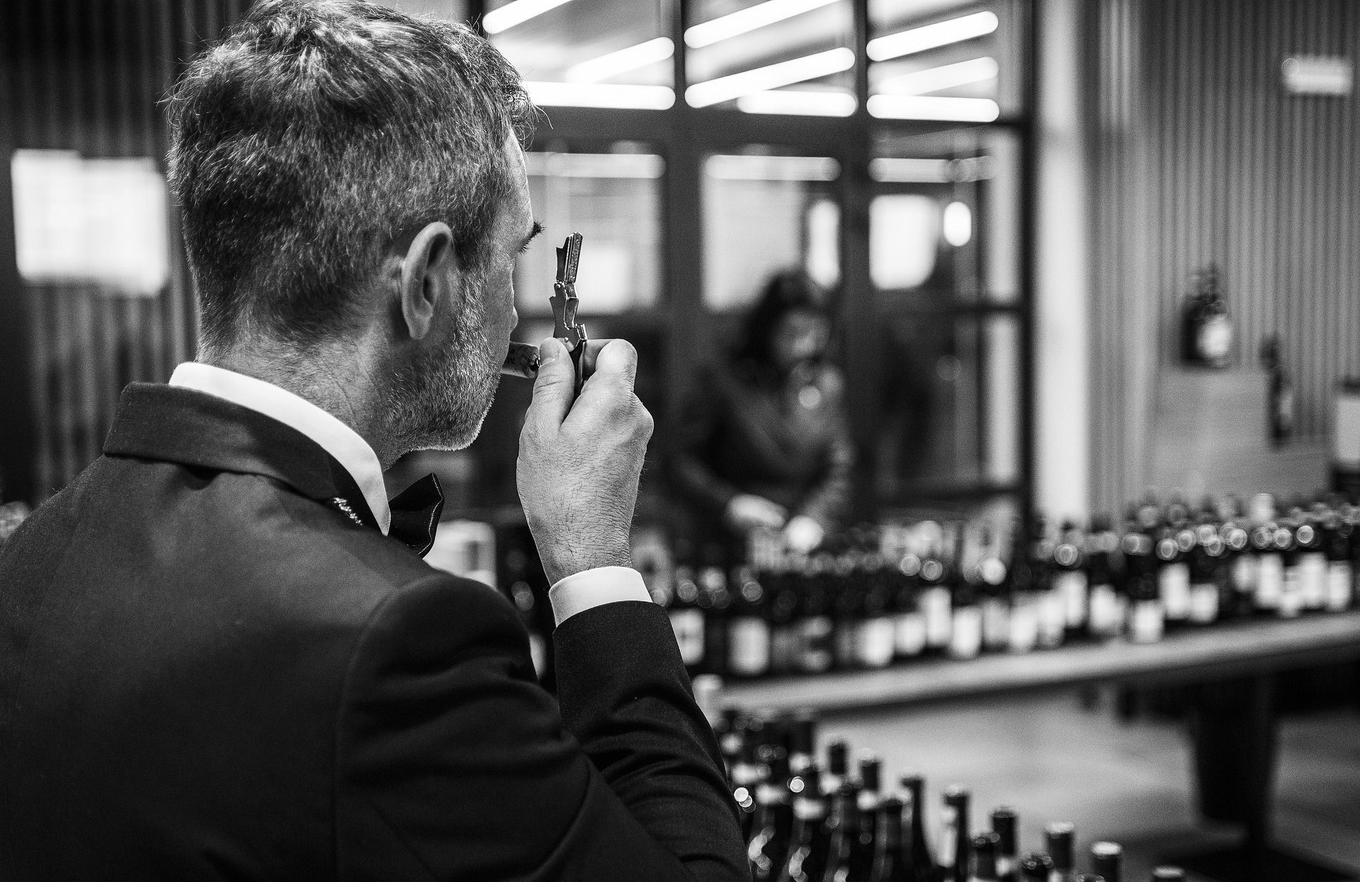 Wine sommelier sniffing the cork