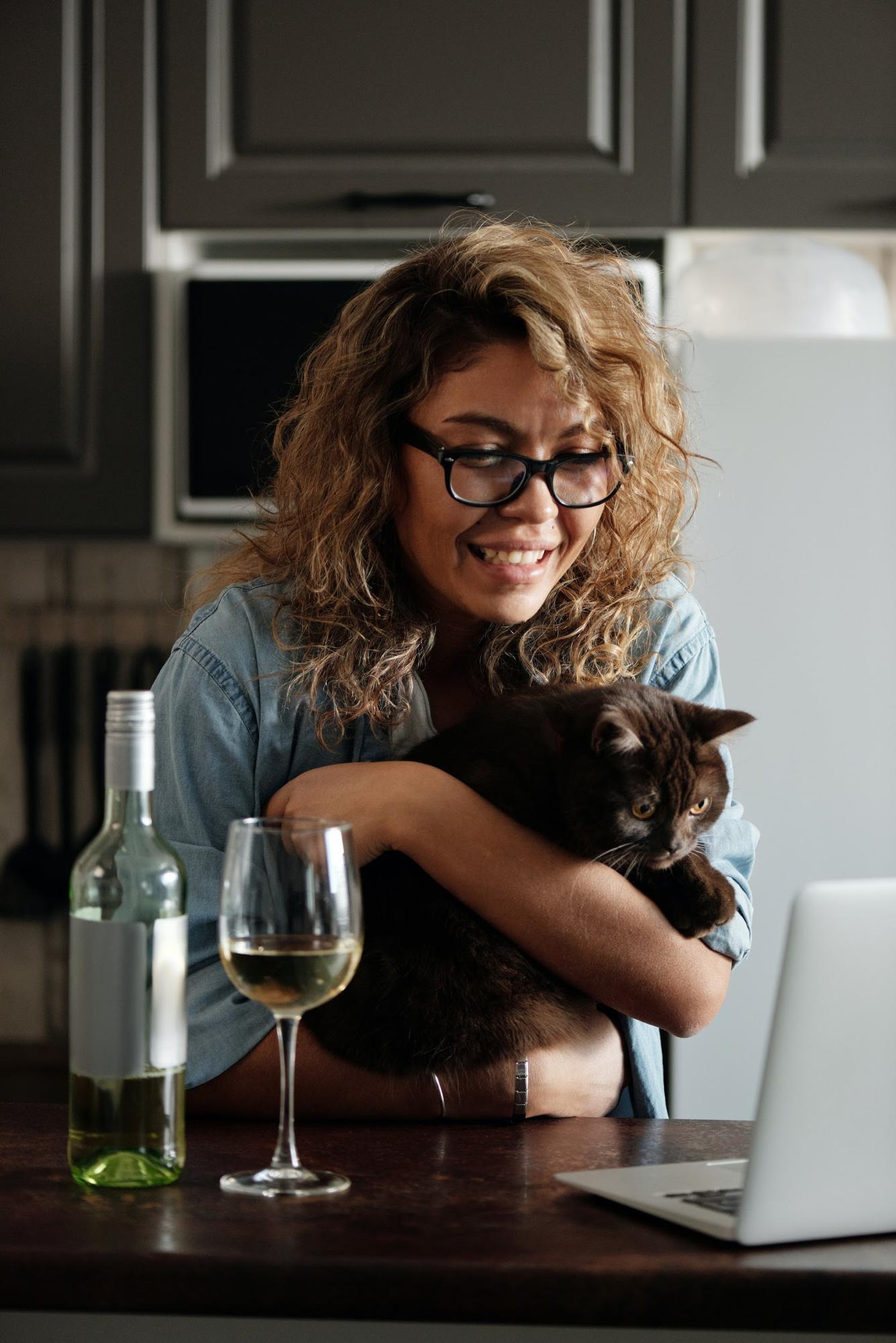 Lady with cat and wine