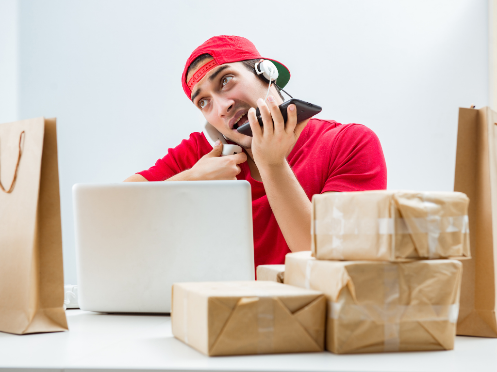 Delivery man managing orders for elearning business