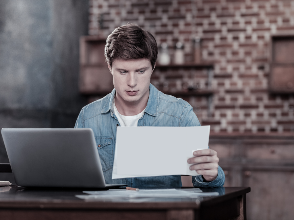 Boy studying for  MCAT preparation