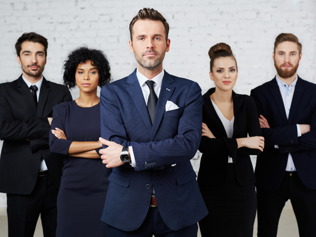 Group of attorneys with their arms crossed.