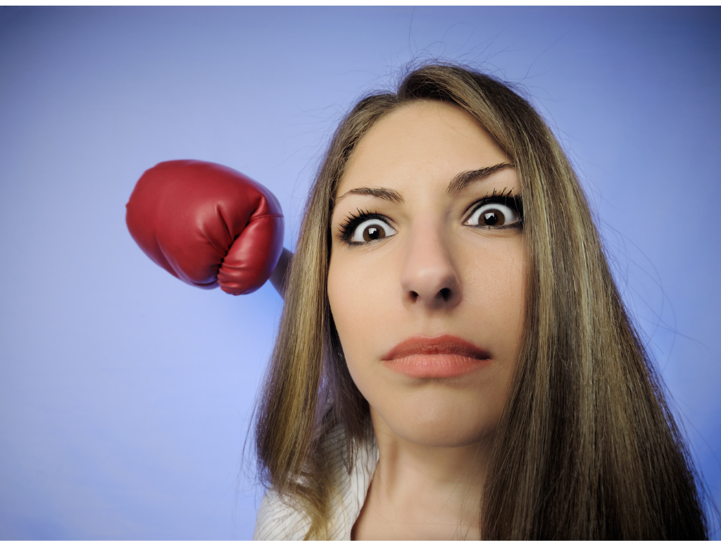 Women and red boxing glove; bar exam stress
