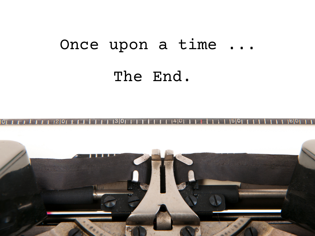 Typing on a type writer the words say "Once upon a time ... The End."