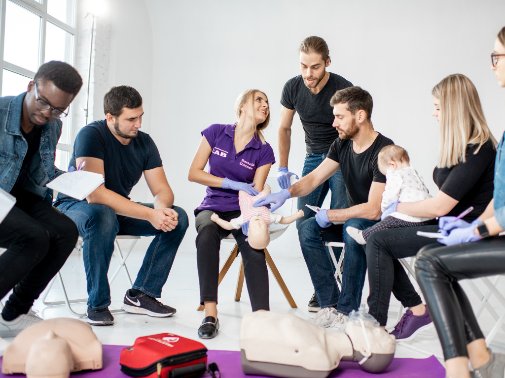 EMS students using an infant to learn about cpr