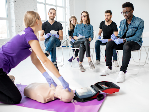 Students watching a CPR demonstration