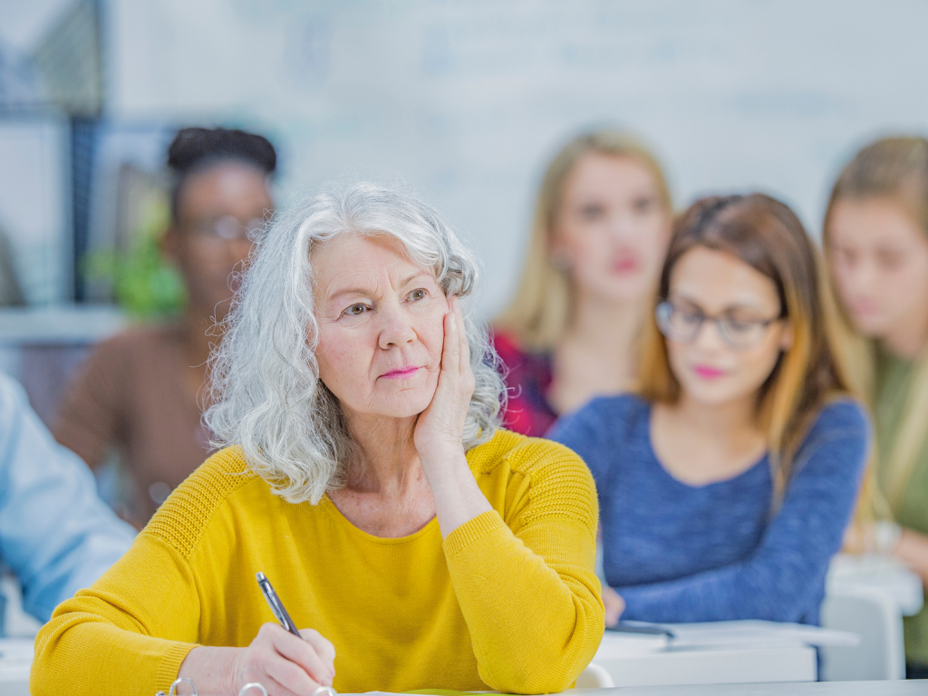 Older people learning language in class