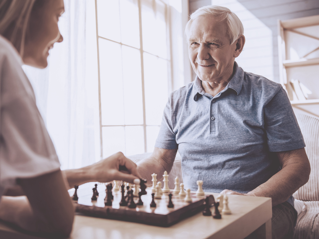 Concentrated serious boy developing chess gambit, strategy ,playing board  game to winner clever concentration and thinking child while playing chess.  Learning, tactics and analysis concept. Free Photo